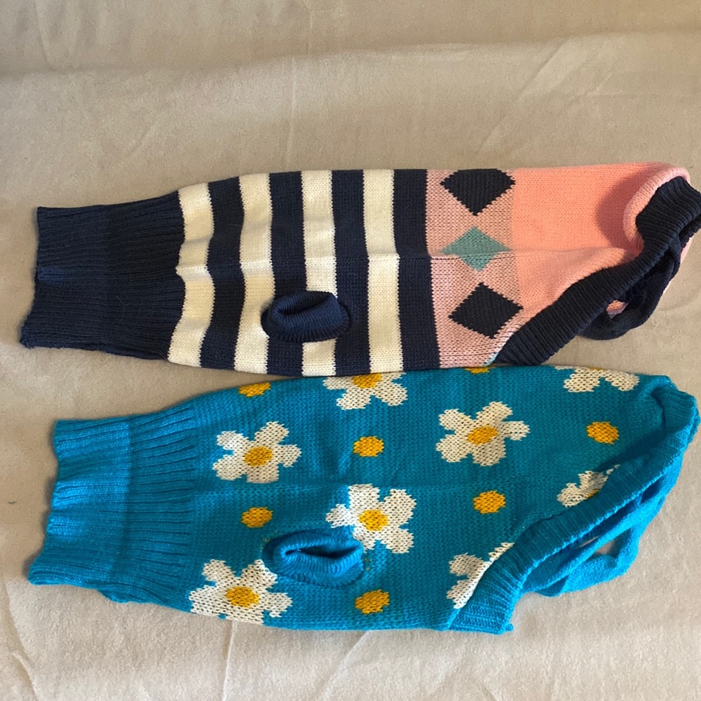 Two dog sweaters.  Brand new